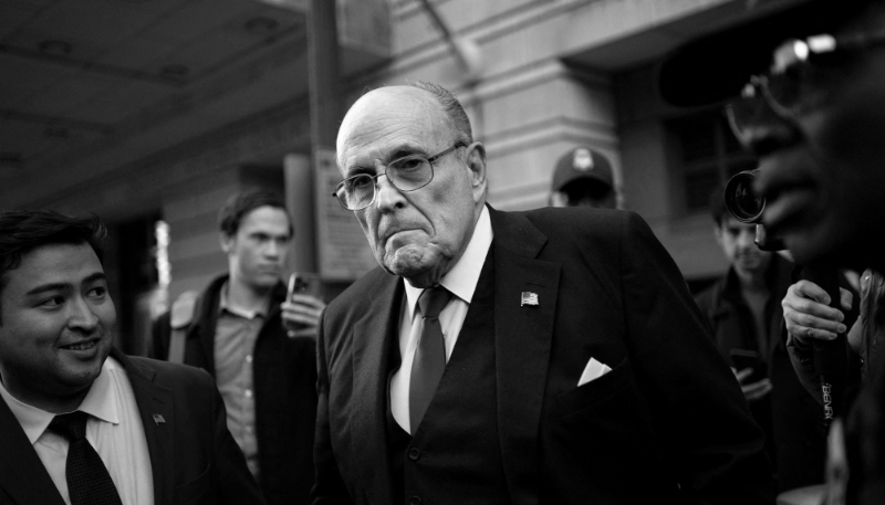 Former NYC Mayor Rudy Giuliani departs the US District Courthouse in Washington, DC, 15 December 2023.
